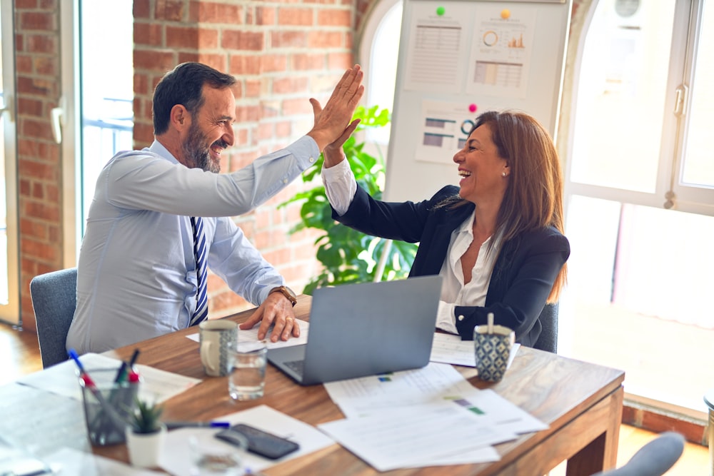Fiduciary 401k agent advising couple on retirement plan
